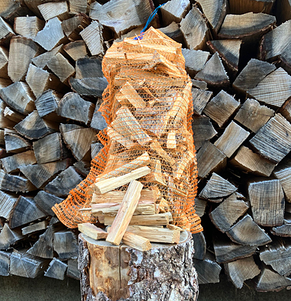 aanmaakhout  in netzak te koop